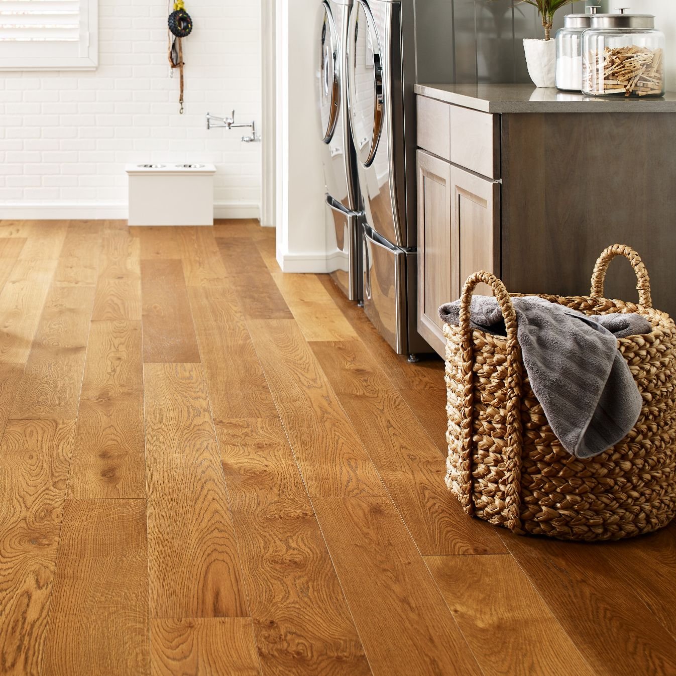 Basket laundry on a brown hardwood from the Floor Store and Design in Columbia